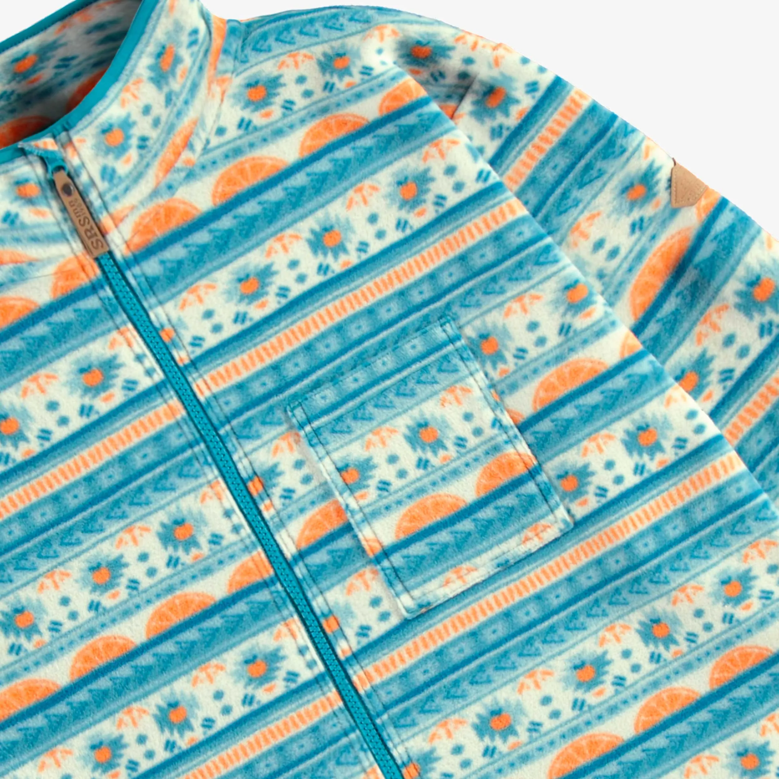 Veste de polar bleue à motifs et col montant, adulte || Blue fleece jacket with patterns and high collar, adult
